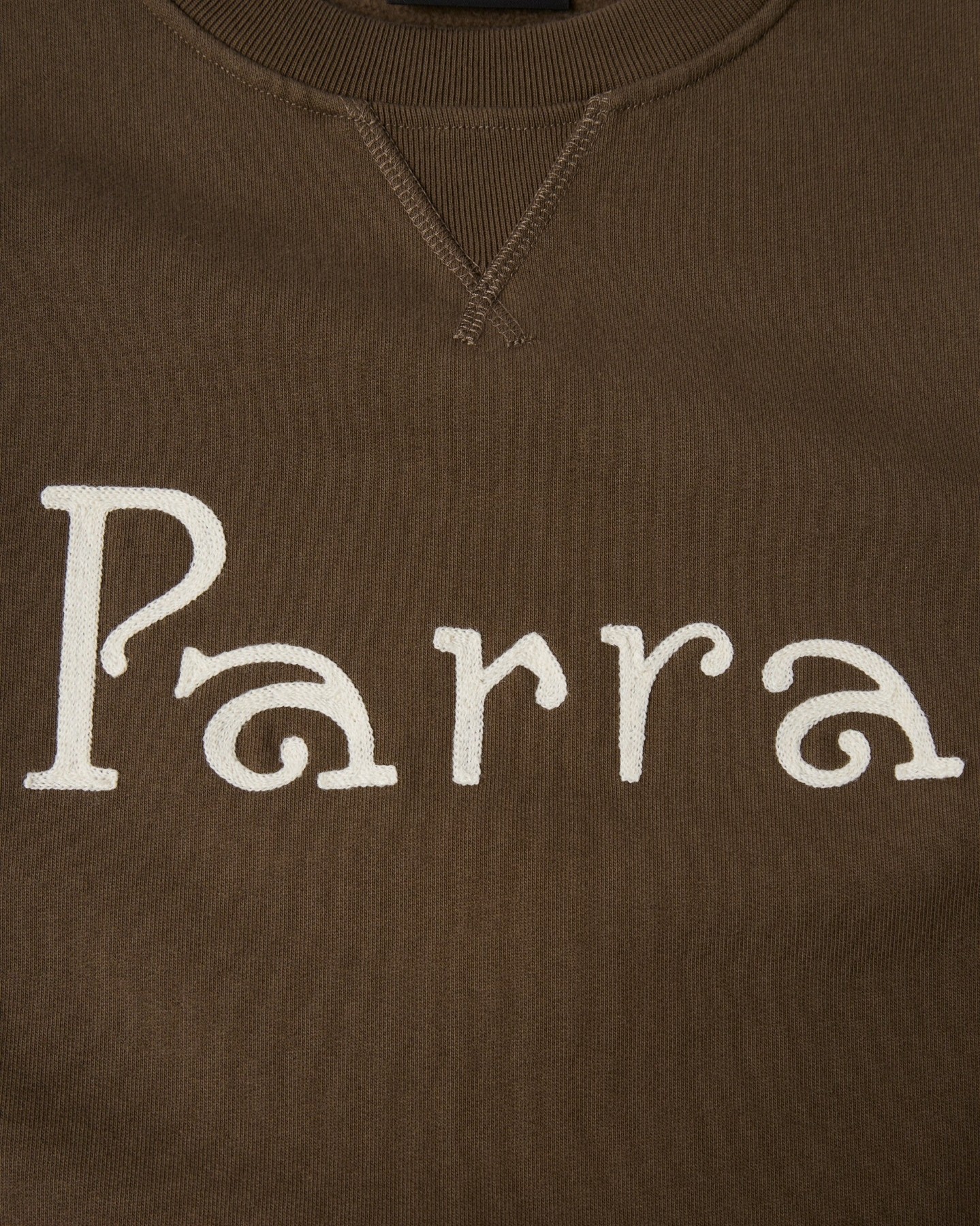 BY PARRA WEIRD TRAD LOGO CREW NECK SWEATSHIRT