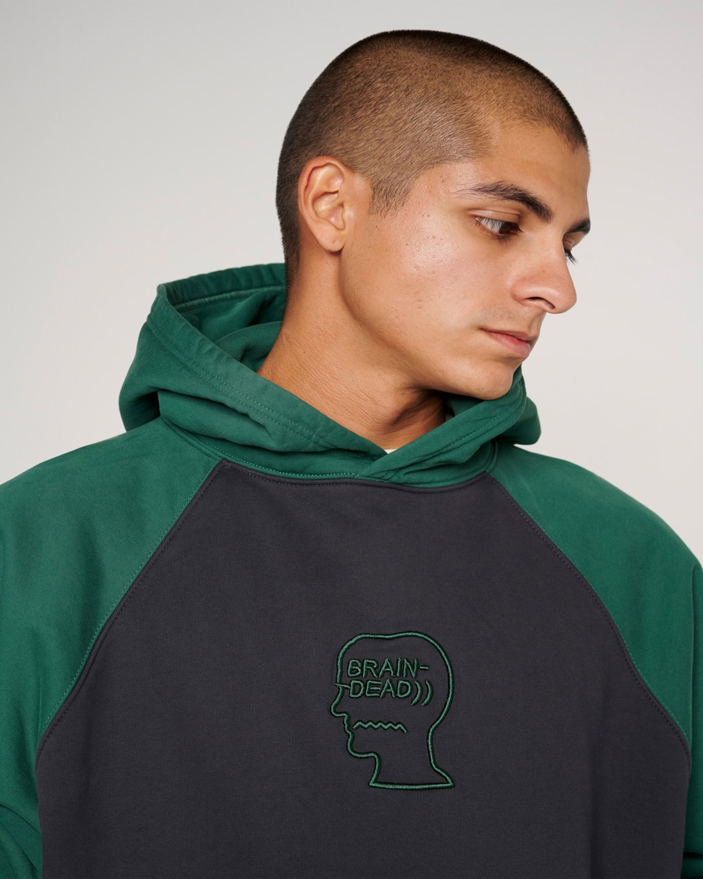 BRAIN DEAD PIGMENT WASH LOGO HERD RAGLAN HOODIE