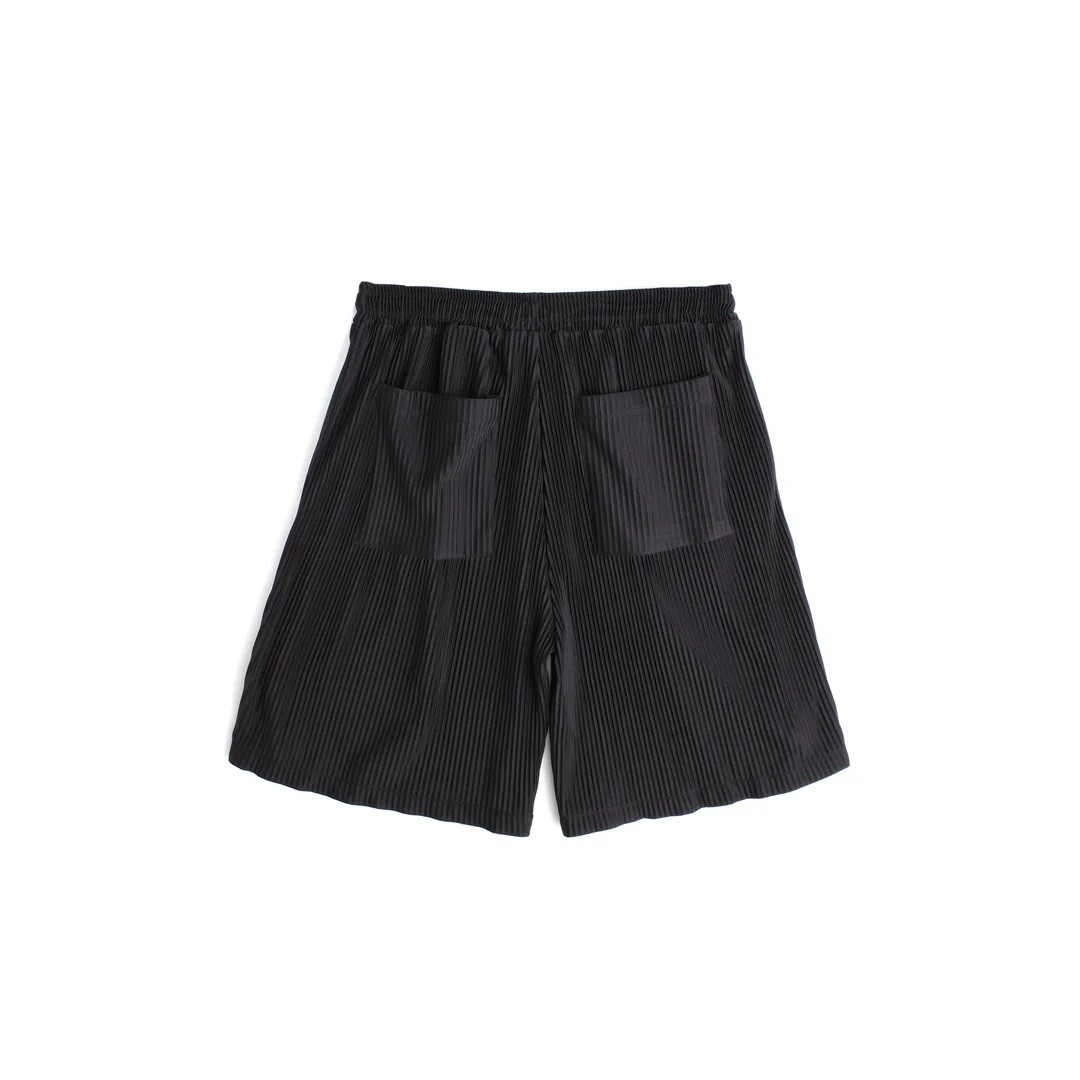 JUNGLES PLEATS SHORTS